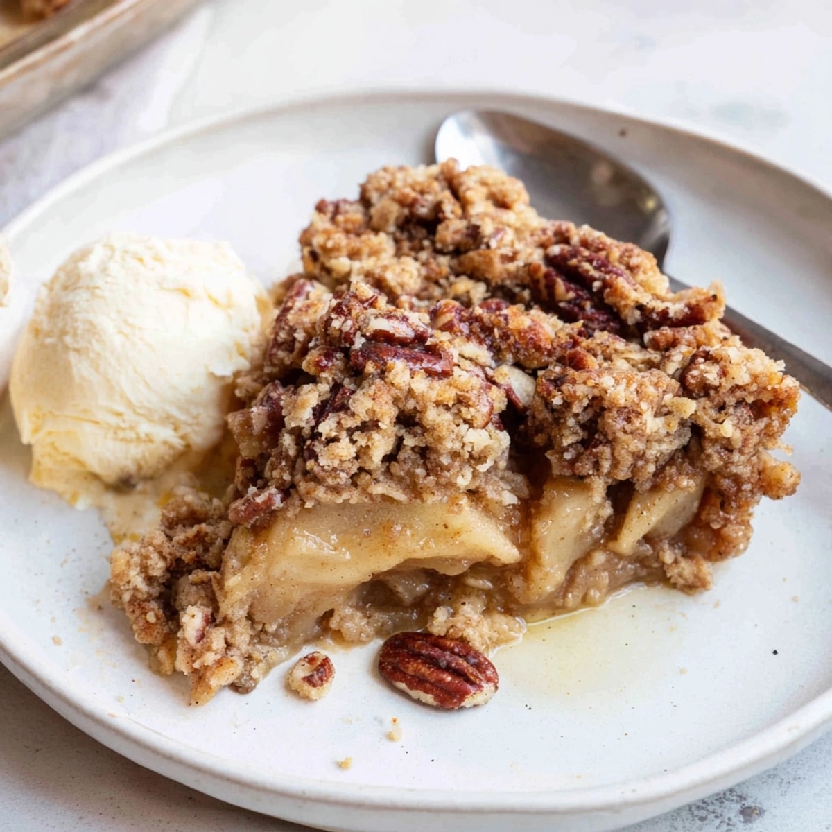 Homemade Pecan Crumble, a buttery comfort food aroma fills the kitchen, fresh from oven.