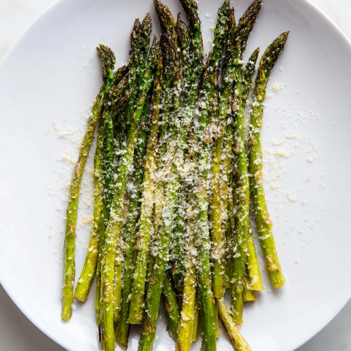 Golden-brown Roasted Asparagus with Parmesan, offering a savory, crispy texture and delightful aroma.