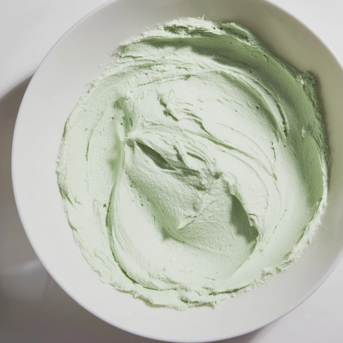 A bowl of fresh, creamy Peppermint Cream Filling, perfectly chilled and ready to use.