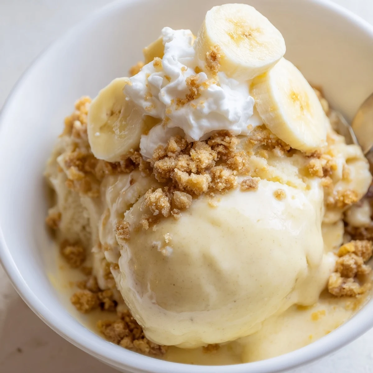 Ninja Creami Banana Cream Pie Ice Cream with buttery graham swirl and banana slices