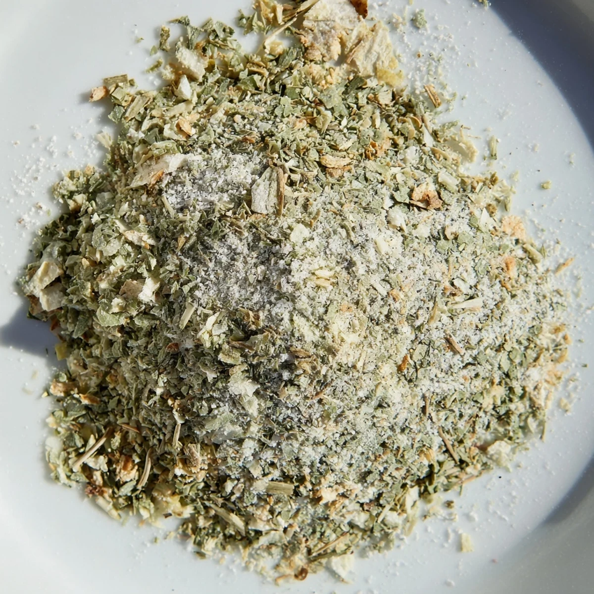 Aromatic dehydrated tzatziki seasoning blend sprinkled over creamy Greek yogurt dip for serving