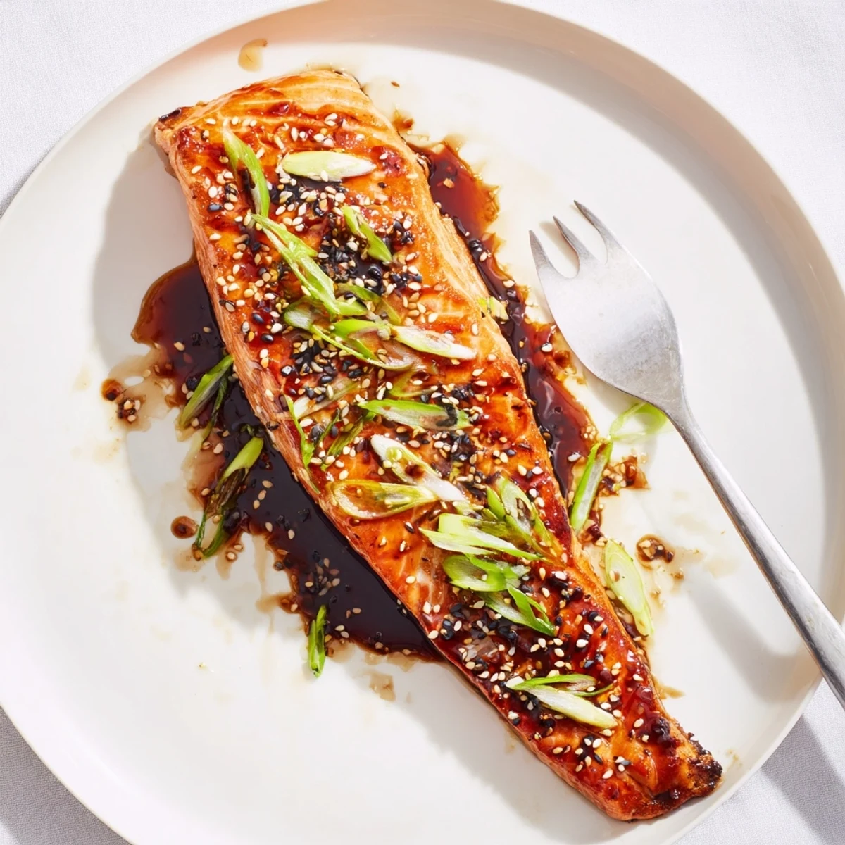 Fresh-from-oven Gluten Free Teriyaki Salmon Recipe served warm with rice and greens